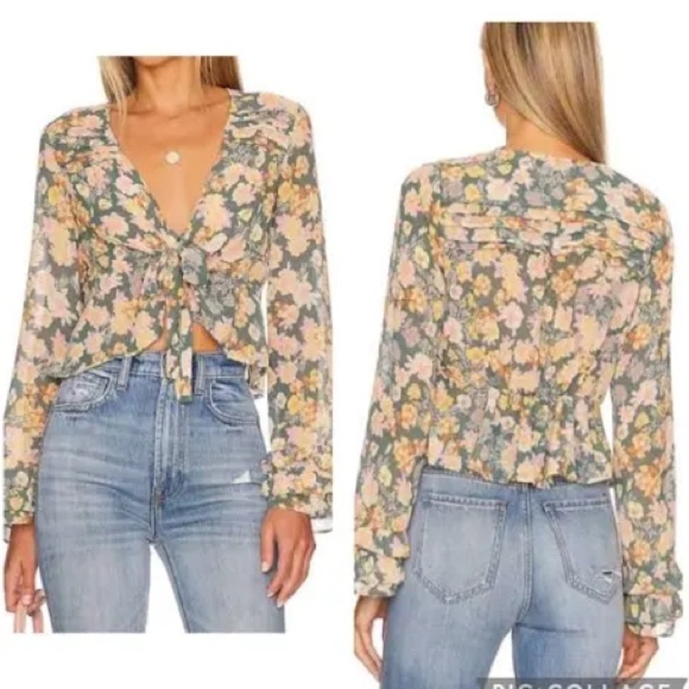 NWT. Free People Happy combo floral top.